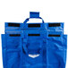 A blue fabric Vollrath storage bag with black straps.