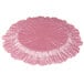 A set of 12 pink glass charger plates with a scalloped edge and a large circular design.