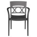 A Grosfillex Moon titanium gray and charcoal stacking armchair with a circular design.