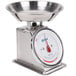 A stainless steel Edlund portion scale with a bowl on it.