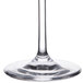 A Stolzle wine glass with a clear stem.