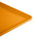 An orange Cambro dietary tray.