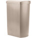 A beige Rubbermaid rectangular trash can with a lid.