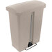 A beige Rubbermaid Slim Jim rectangular front step-on trash can with a handle.