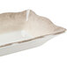 A white rectangular Thunder Group melamine tray with a scalloped brown rim.