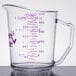 A Cambro Camwear measuring cup with purple writing on it.