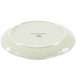 A white ceramic Tuxton china platter with a sagebrush pattern on the rim.