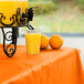 Creative Converting 013021 100' Sunkissed Orange Disposable Plastic Table Cover Main Thumbnail 1