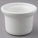 A close up of a white Tuxton china bowl with a white rim.