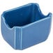 A blue ceramic Fiesta sugar caddy with a curved edge and a handle.