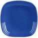 A close-up of a Fiesta® lapis square luncheon plate with a white center and blue rim.