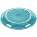 A Fiesta turquoise plate with a white rim.