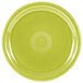 A lemongrass green Fiesta Healthcare China plate with a circular design.