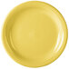A close-up of a yellow Fiesta appetizer plate with a ring on it.