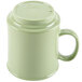 A close-up of a green GET Diamond Harvest Tritan mug with a handle and lid.