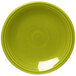 A close-up of a Fiesta® Lemongrass bread and butter plate with a circular pattern in green.