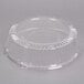 A WNA Comet clear plastic round high dome lid over a clear plastic container with a curved edge.