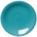 A Fiesta turquoise bread and butter plate with a circular white rim.