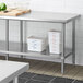 Regency Adjustable Stainless Steel Work Table Undershelf for 30" x 84" Tables - 18 Gauge Main Thumbnail 1