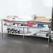 Regency Adjustable Stainless Steel Work Table Undershelf for 24" x 84" Tables - 18 Gauge Main Thumbnail 5