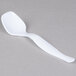 A Fineline white plastic serving spoon.
