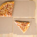 A slice of cheese pizza on a GreenBox pizza box with a built-in plate.