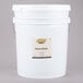 A white bucket with a label reading "Golden Barrel Sulfur-Free Blackstrap Molasses"