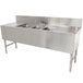 A stainless steel Advance Tabco underbar sink with 3 compartments, 2 drainboards, and a deck mount faucet.