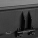 A black plastic carrying case for a Waring electric knife.