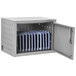 A gray Luxor metal wall mount tablet charging station with iPads inside.