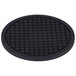 A black round American Metalcraft silicone trivet with a square pattern.