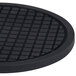 An American Metalcraft black silicone trivet with a grid pattern.