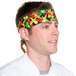 A man wearing a multi pepper patterned chef neckerchief.