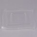 A clear rectangular lid with a wavy design.