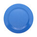 A white melamine plate with a blue speckled circular edge.