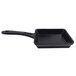 A black square pan with a handle.