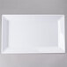 A white rectangular Elite Global Solutions melamine serving platter.