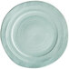 A mint green Elite Global Solutions Della Terra melamine plate with a spiral design.