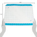 A white Ateco silicone mat with a blue grid and black text.