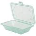 A jade plastic container with a flat lid.