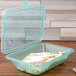 A clear plastic GET Eco-Takeout container with food inside.