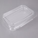 A 10" x 7" x 2" clear plastic tamper-evident take out container with a lid.