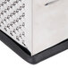 A close up of a Tablecraft stainless steel box grater with soft grip handles.