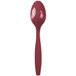 A close-up of a burgundy plastic spoon with a handle.