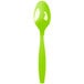 A lime green heavy weight plastic spoon with a white handle.