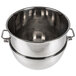 A stainless steel Vollrath mixing bowl with two handles.
