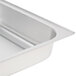 A Vollrath stainless steel chafer cover on a counter.