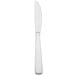 An Arcoroc stainless steel dinner knife with a black handle on a white background.