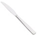 An Arcoroc stainless steel dessert knife with a long, silver handle.