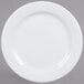 A Tuxton Sonoma bright white china plate with a swirl design.